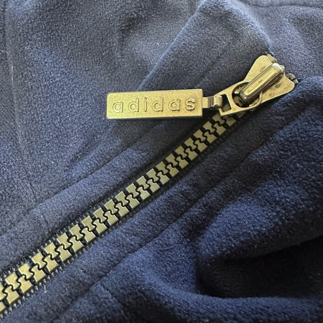 Veste Adidas Vintage “One World” – Années 90