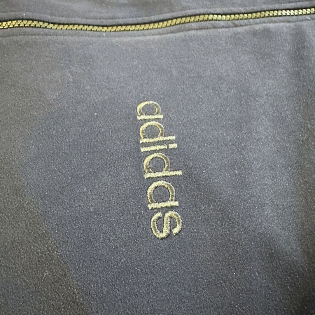 Veste Adidas Vintage “One World” – Années 90