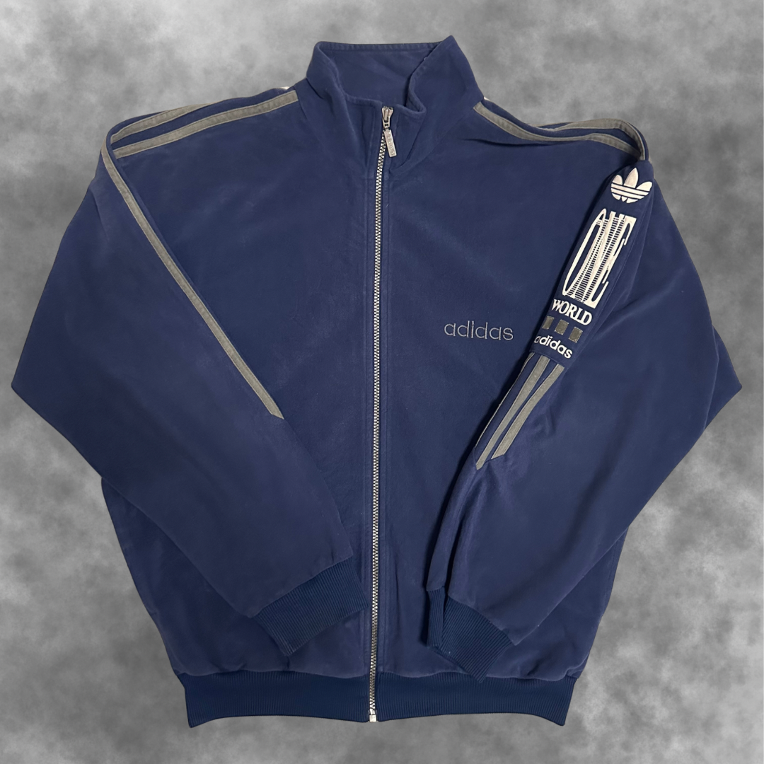 Veste Adidas Vintage “One World” – Années 90