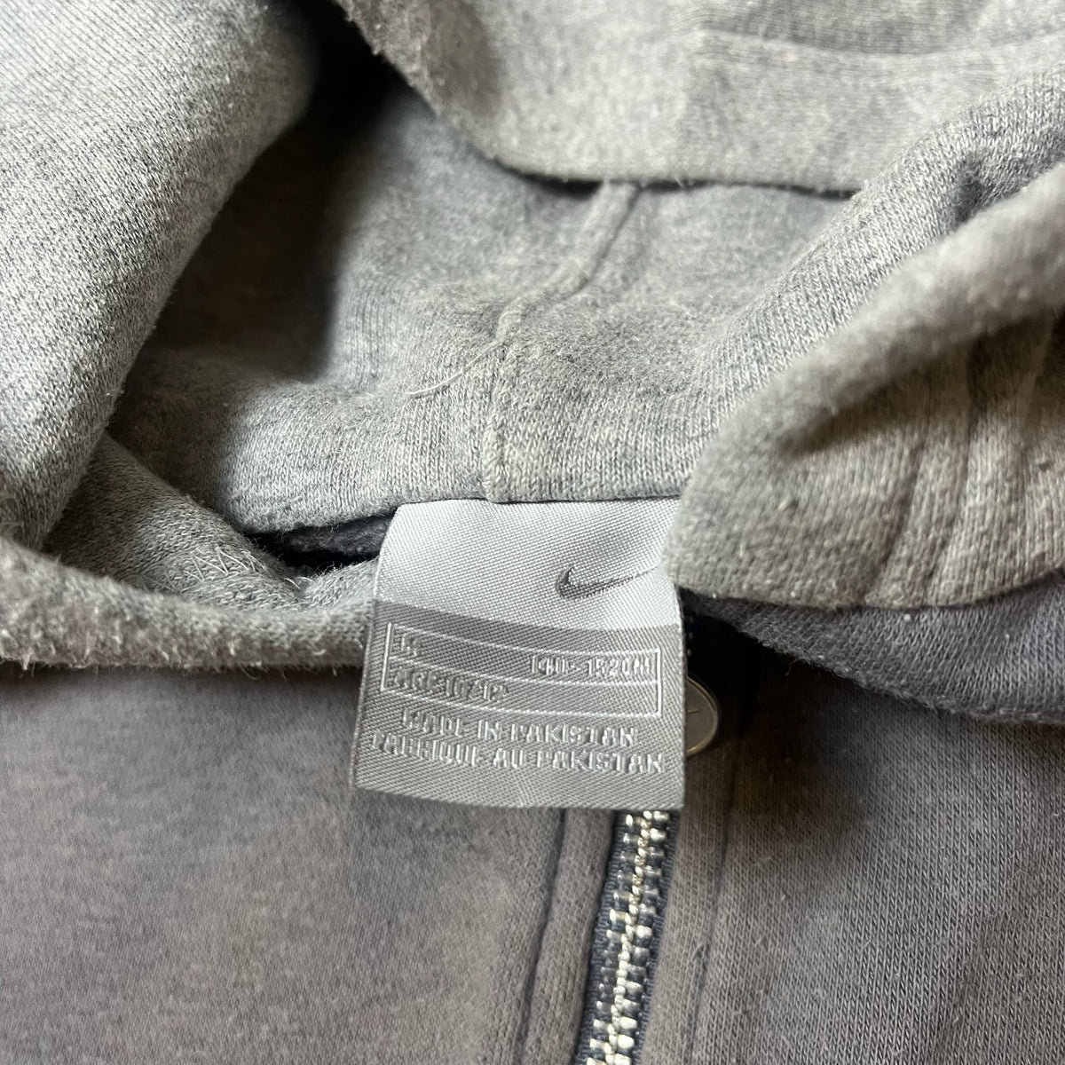 Étiquette Nike avec informations de fabrication
