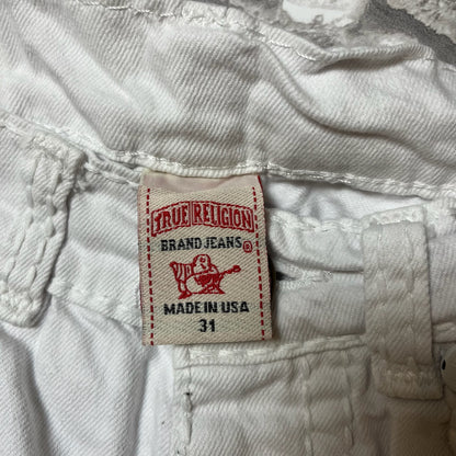 Étiquette tissu True Religion taille 31 sur jean blanc