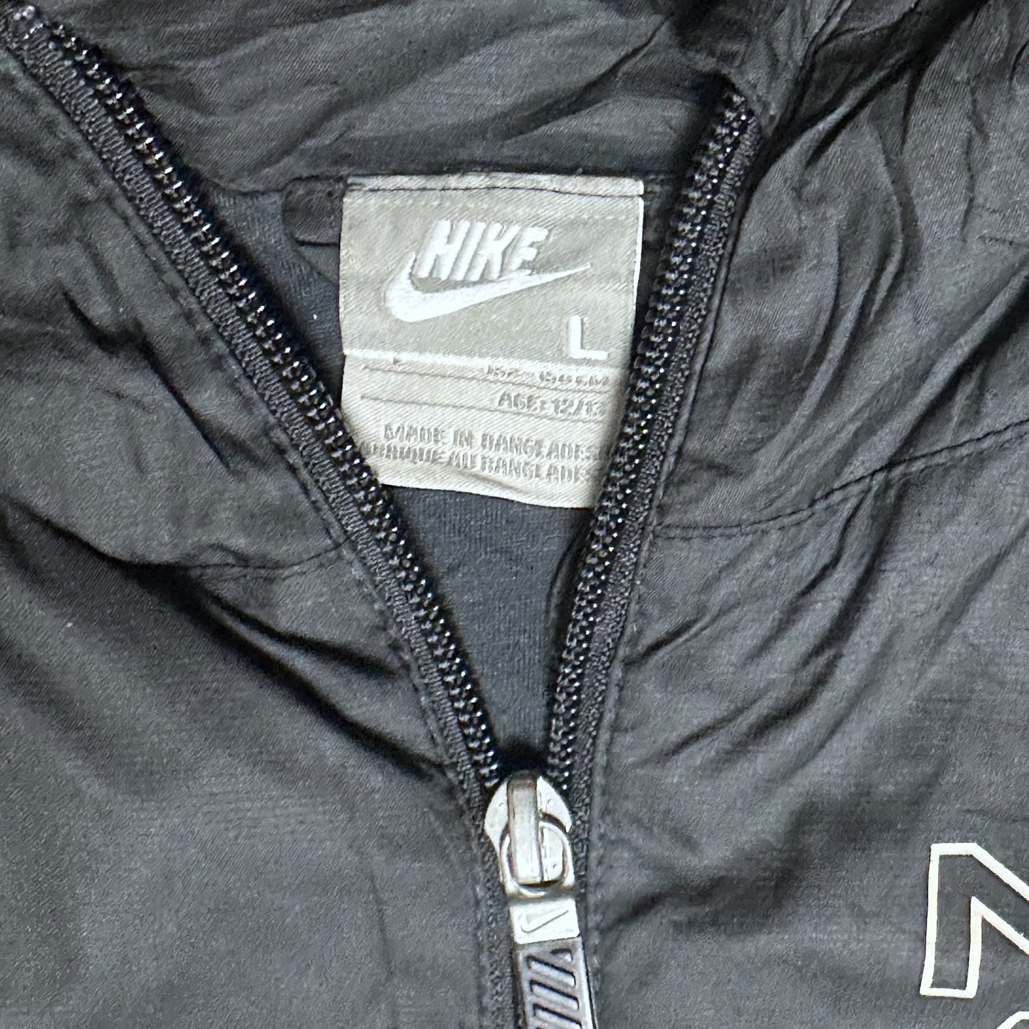 Veste coupe-vent Nike Air – Taille L (12–13 ans)