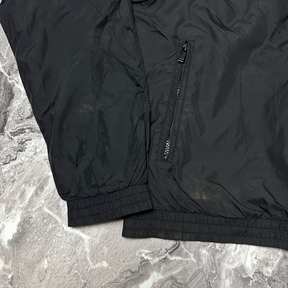 Vintage Lacoste Jacke in Schwarz – Größe L