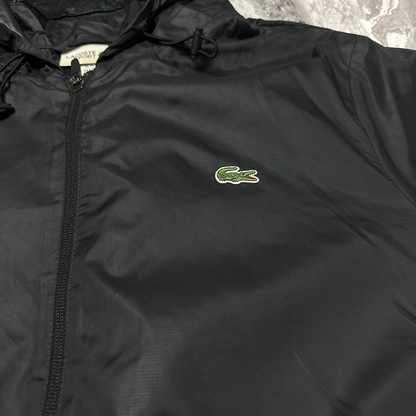 Lacoste Sport Windbreaker-Jacke, Schwarz – Größe XL