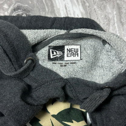 Sweat à capuche New Era Saskatchewan Rattlers – Taille M