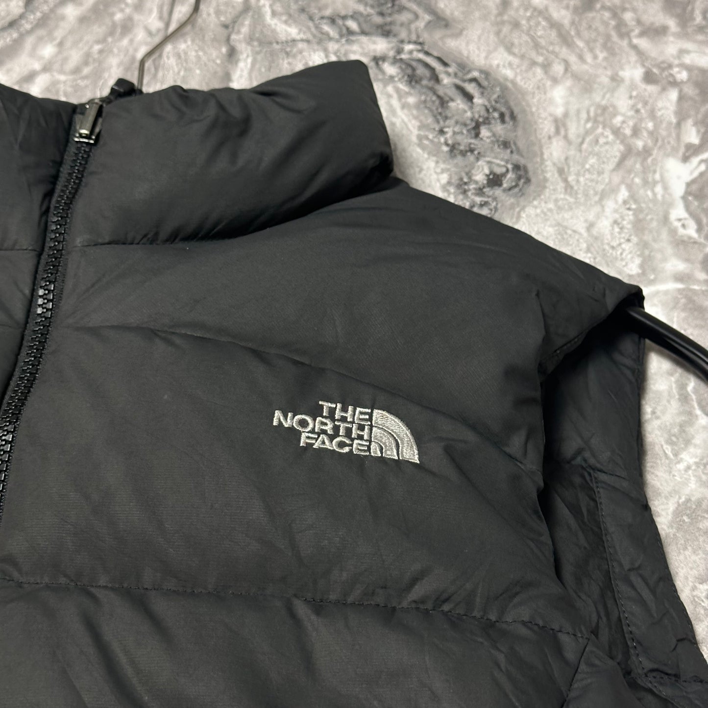 The North Face 700 ärmellose Steppjacke, Schwarz – Größe L (Damen)