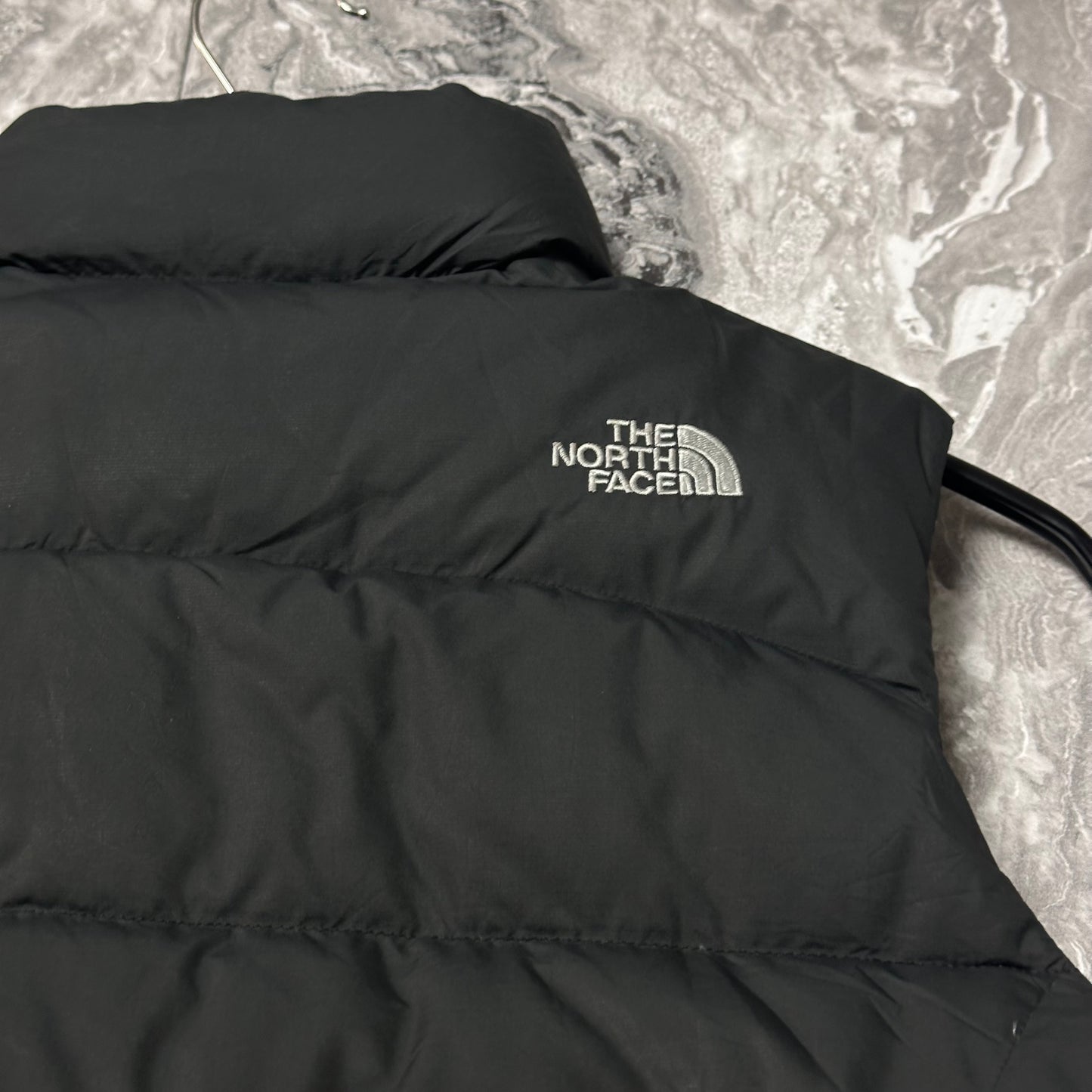 The North Face 700 ärmellose Steppjacke, Schwarz – Größe L (Damen)