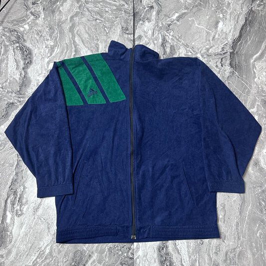 Veste Adidas bleu marine et vert vue de face