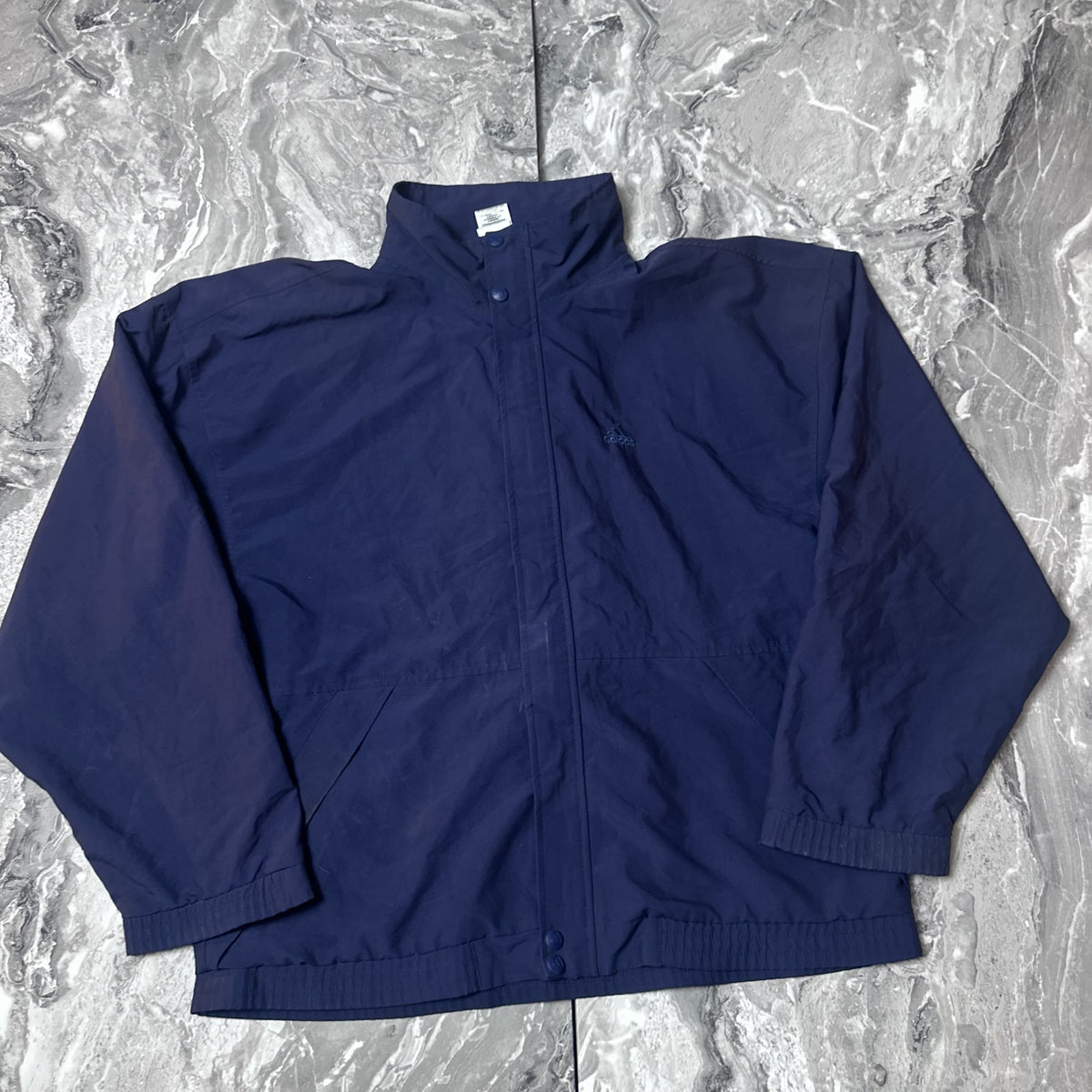 Veste Adidas golf bleu marine vue de face