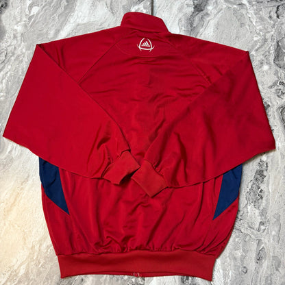 Poignets et bas élastiqués du sweat Adidas rouge