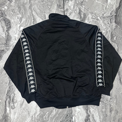 Dos de la veste Kappa noire avec bandes logo sur les manches