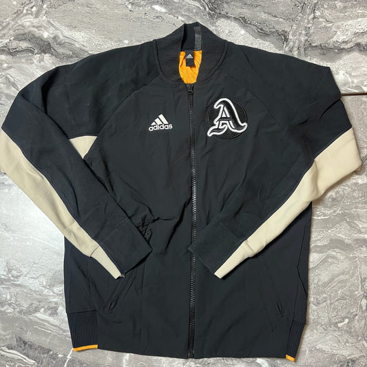 Veste Adidas noire et beige vue de face