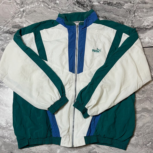 Veste Puma sportive blanc vert et bleu vue de face