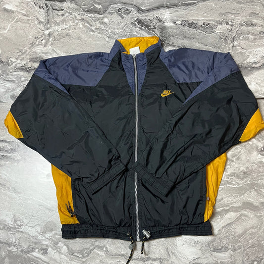 Dos de la veste Nike sport jaune noire bleu