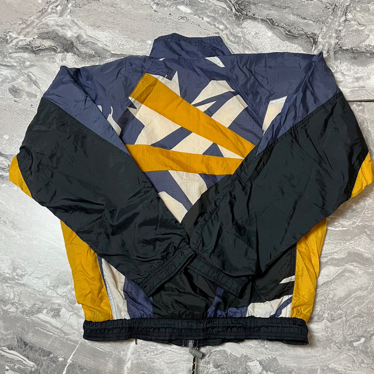 Étiquette Nike avec composition et taille XS