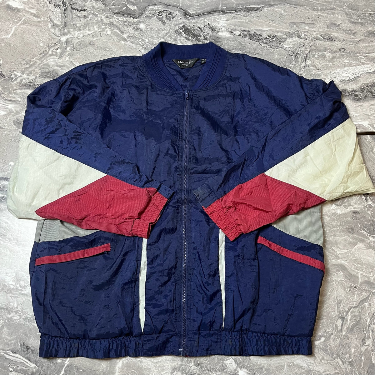 Veste Christian Dior bleu marine rouge et blanc vue de face