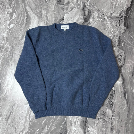 Pull Lacoste bleu en laine vue de face